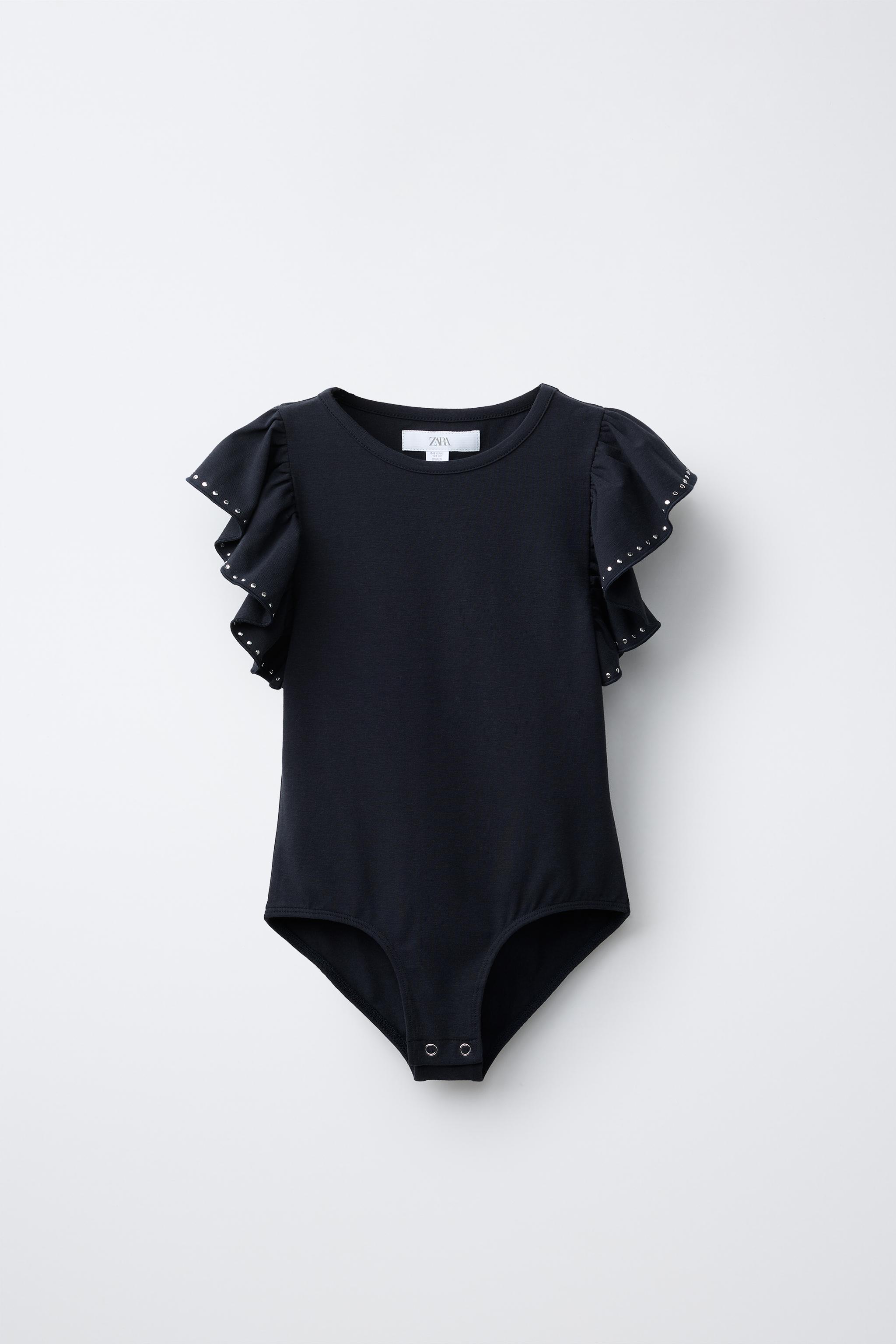 RUFFLED BODYSUIT WITH STUDS AND MODAL